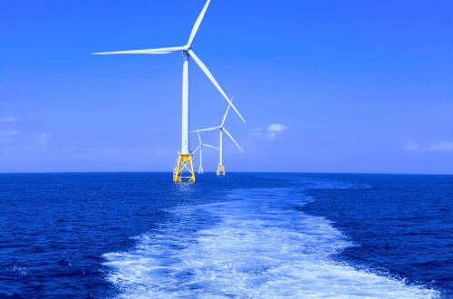 wind mill on a blue sea